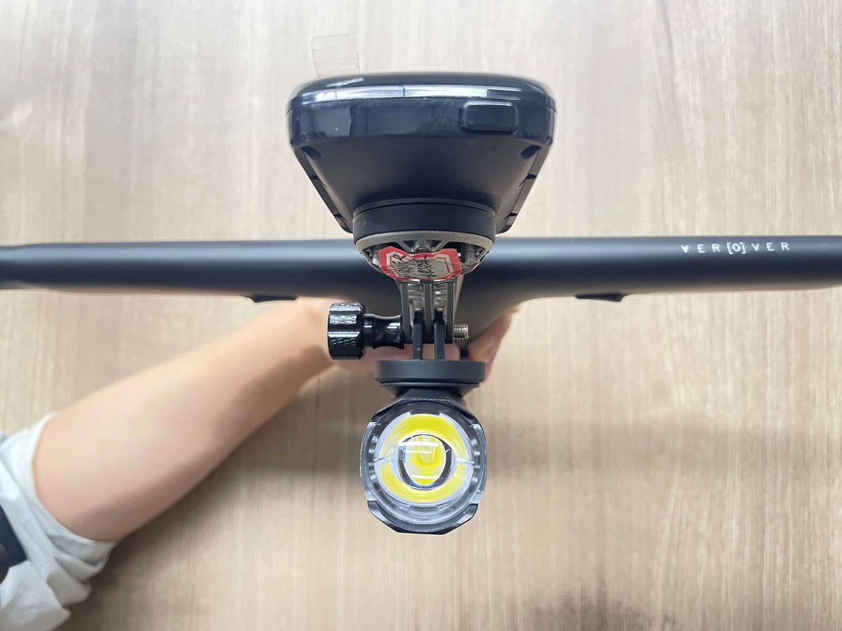 Samassi titanium mount on an EXS AeroVer bar with a computer and light